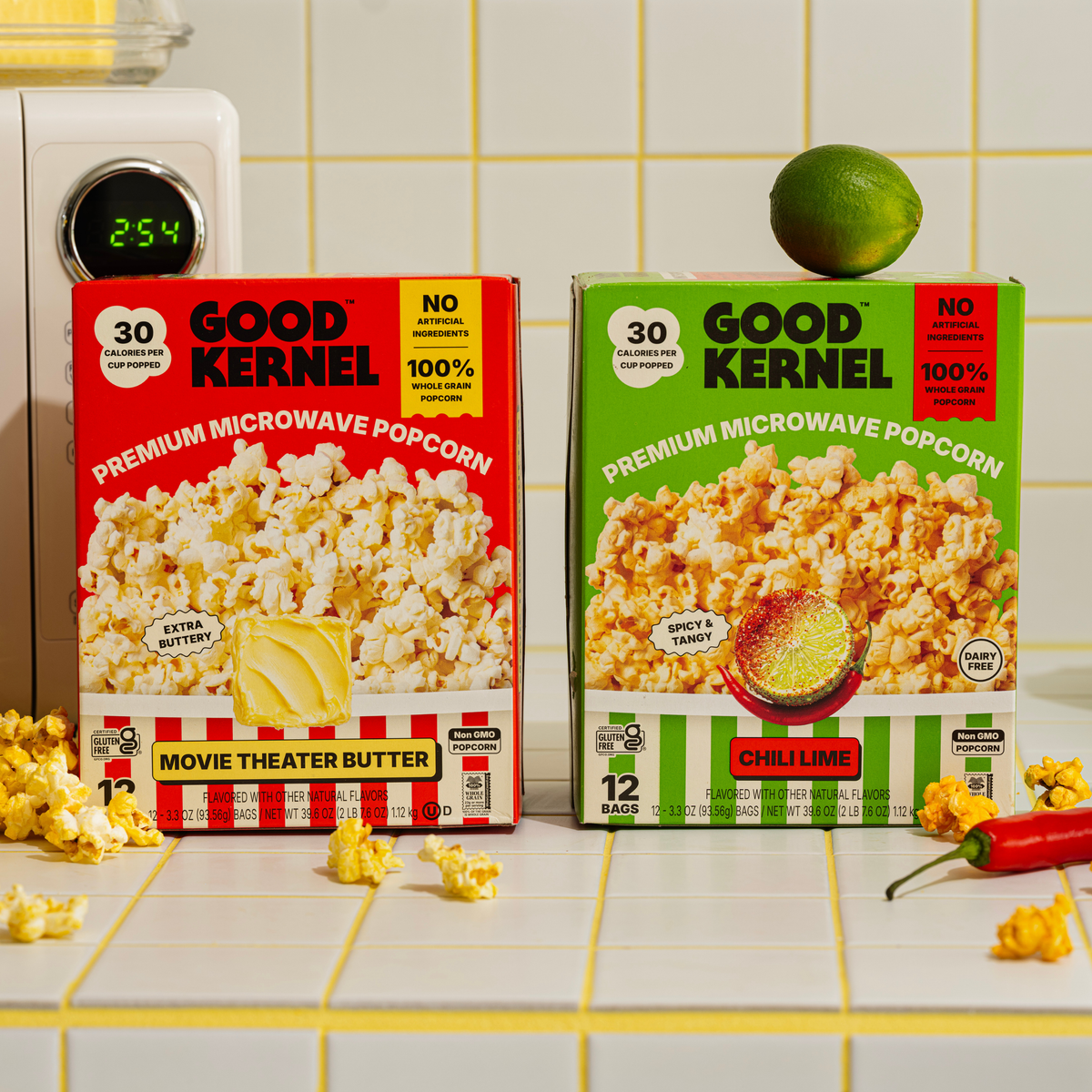 Movie Theater Butter and Chili Lime boxes on a kitchen counter next to the microwave